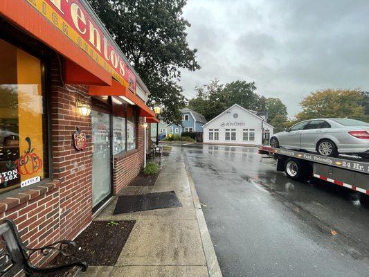 Driver takes me in the wrong direction, goes and orders dinner, blocks all the cars in the parking lot, then charges me for extra mileage.