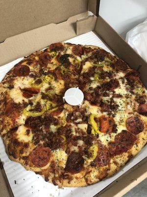 Pepperoni, banana pepper, pineapple, and bacon. Tons of bacon! So good!