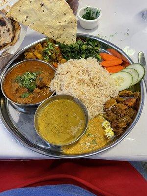 Nepalese goat, lentil soup, spinach, etc.