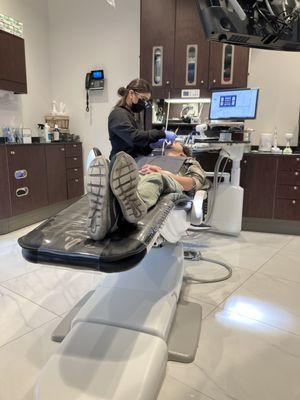 My husband getting his teeth cleaned