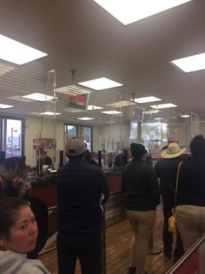 2 Tellers the line out the door on a Saturday morning