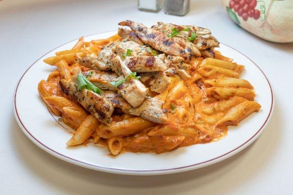 Penne alla vodka with grilled chicken.