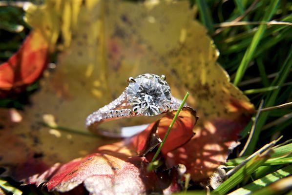 Split shank 18k white and pink gold Gabriel setting with round brilliant center stone