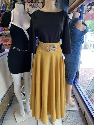 little black dress + belt (left), black sleeve-top with yellow skirt + belt (right)