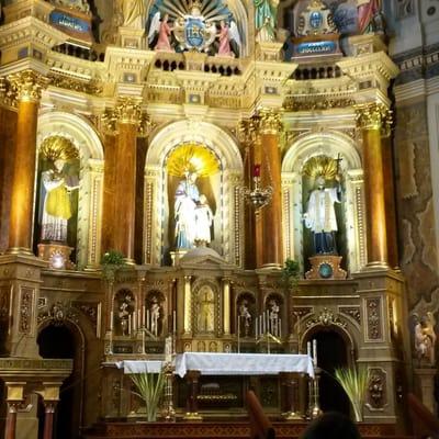 Wooden altar painted with gold