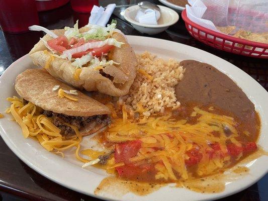 Mexican plate with puffy taco and crispy taco