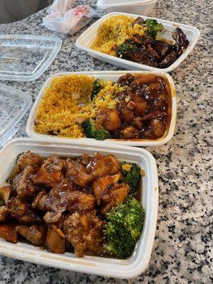 Bottom is Orange Chicken, middle is General Tso Chicken combo and top is C23. Bourbon Chicken Combination Plate