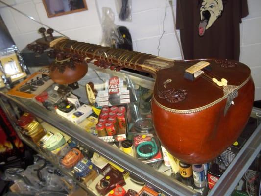 1971 handmade Sitar from India & lots of effect pedals,guitar, & stringed instrument accessories