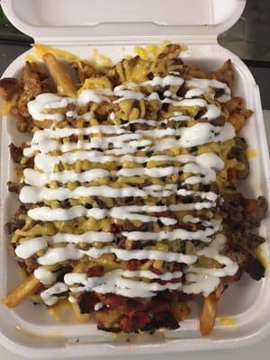 300 fries. 3 meats over a bed of fries.