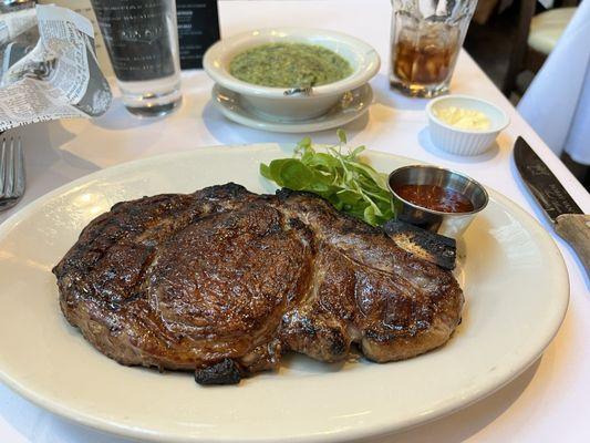 Bone-in ribeye steak, medium rare.