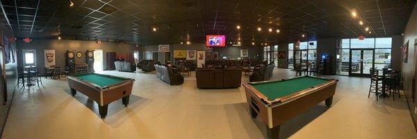 Wide shot of the lounge we added a tv over the bar and one between the lockers after the picture