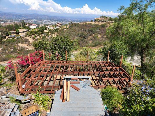 Deck renovation project in San Marcos. We removed rotted boards, joists and railings.we will install painted redwood and Trex floorings.