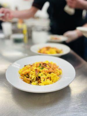 Breakfast hash with scrambled eggs