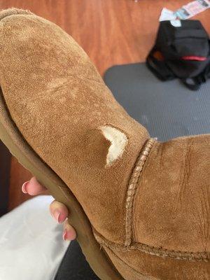 Hole straight through the Ugg boot