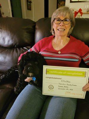 Our youngest fur baby, Ellie Mae with her Graduation Certificate