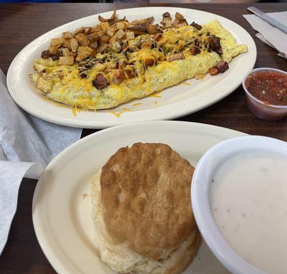 Loaded Omelet and biscuit with gravy.