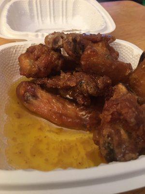 A17. 4 Pieces Honey Chicken Wings Very good and light sweet honey sauce to dip and coat them in! Very delicate flavor here!