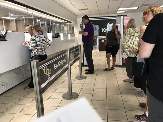 Long line, one teller, as always!