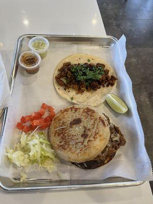 Carnitas gordita and Al Pastor tacos