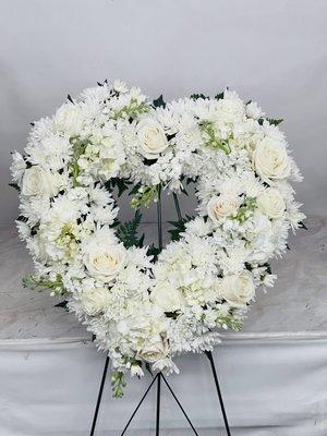 All white heart funeral tribute