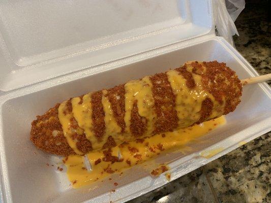 Elote with hot cheetos and cheese