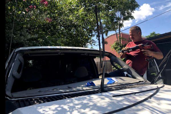 Windshield replacement in progress in Austin.