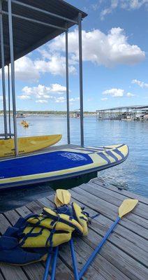 Life jacket, paddles, kayak