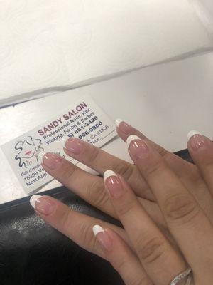 Beautiful manicure french tip done by Sandy Amazing mya is also amazing