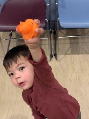 Showing off the "orange duck-duck" he earned for doing such a good job! Dr. Job and his staff for the win!