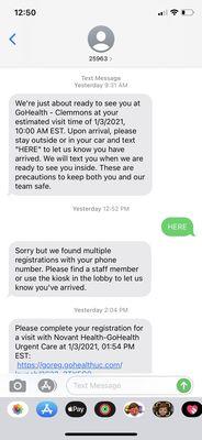 Picture showing the text telling me to go inside and the text when I was finally checked in over an hour later.