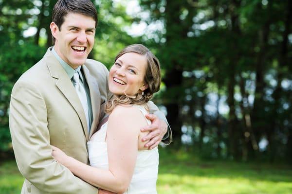 Leise Jones Photography; A bride and groom embrace in a warm moment before the ceremony for their off-beat wedding.