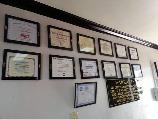 Certificates, diploma, and a bunch of other stuff. These people know what they're doing.