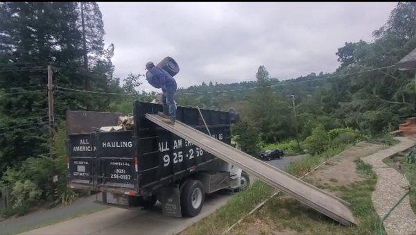 Sometimes you just have to get creative on how you load a truck! Doing Debris removal in Lafayette CA today give us a call.