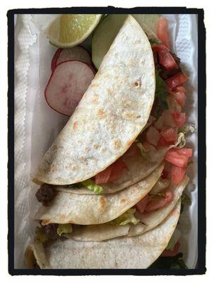 Three steak tacos