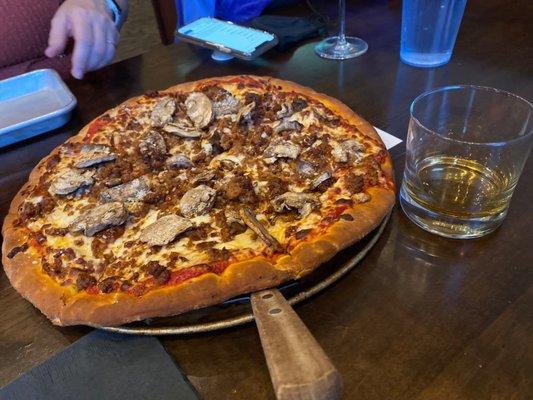 Sausage and mushrooms pizza with Breckinridge Bourbon