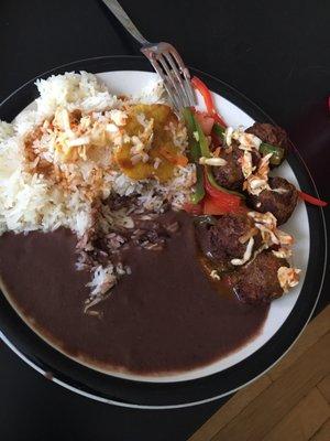 Haitian meatball, white rice and bean sauce