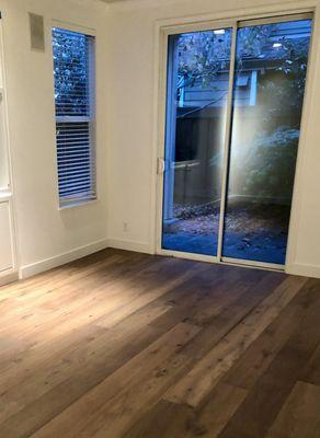 New wood floor in dining room, installed by Carpetworks