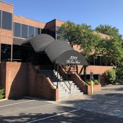 Our Building entrance at the corner of Bee Cave Rd and Westbank