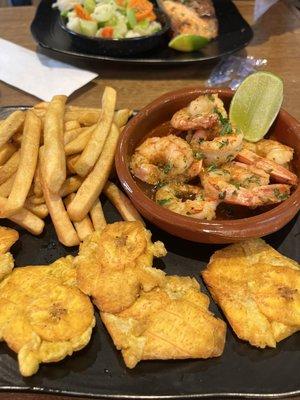 Tostones , grilled shrimp, French fries