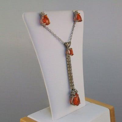 This beautifully matched set of natural of deep rusty orange Mexican Fire Opals with brilliant diamonds is sure to make an impression.