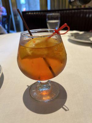 Manhattan cocktail was not served in a tumbler and was difficult to sip.