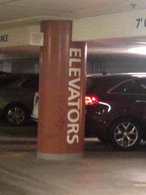 Clearly marked elevators in parking garage