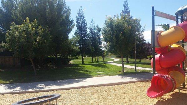 Green belt walkway connecting neighborhood to park