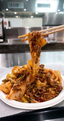 N1: Spicy Cumin Lamb Hand-Ripped Noodles (孜然羊肉乾扯面). $14.25