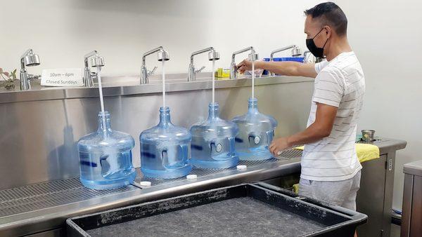 They rinse bottles & caps before filling.