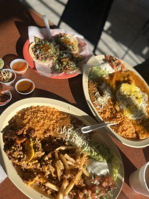 Huevos con chorizo, chilaquiles with red salsa & some tacos to satisfy!