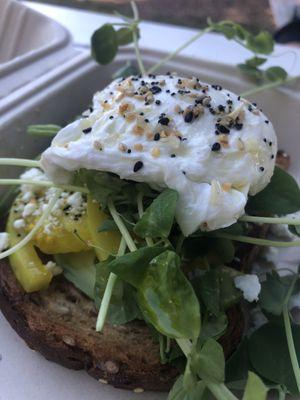 Avocado toast with pickled green tomatoes