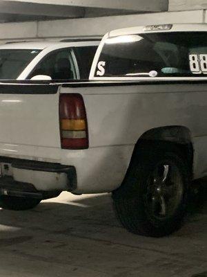 Pick up truck with coded white power symbols (88)