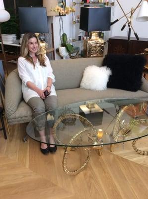 Sitting pretty on a original Ward Bennett Houndstooth sofa.