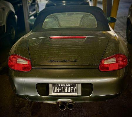 The VA hospital has a couple of covered parking garages. First time I saw this one... Porsche Boxster S chopper pilot car.